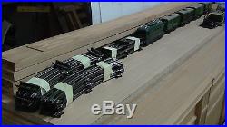 Locomotive Hornby Echelle 0 + 4 wagons + rail courbe +Transformateur